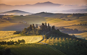 Podere Belvedere, San Quirico d Orcia, Tuscany, Italy. Sunrise over the farmhouse