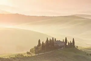 Podere Belvedere and the Val d'Orcia on a misty dawn, San Quirico d'Orcia, Tuscany, Italy
