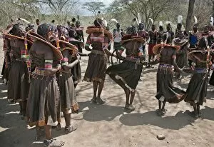 Chemsik Collection: Pokot men and women dancing to celebrate an Atelo ceremony. The Pokot are pastoralists speaking a