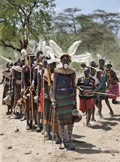 Ostrich Feathers Prints: The Pokot have a small ceremony called Koyogho when a man pays his in-laws the balance of the agreed dowry for his wife