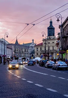 Poland, Lublin Voivodeship, City of Lublin, Krolewska Street and City Hall at sunset