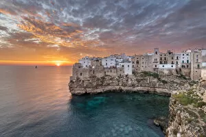 Images Dated 18th October 2021: Polignano a Mare during a summer sunrise (province of Bari, Apulia, Italy)
