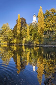 Pond in the castle park of Bad Homburg vor der Hoehe with white tower, Taunus, Hesse