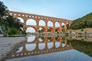Images Dated 5th July 2014: Pont du Gard Roman aqueduct over Gard River at dusk, Gard Department, Languedoc-Roussillon