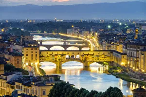Arno Prints: Ponte Vecchio on the Arno river and buildings in the old town at night, Florence