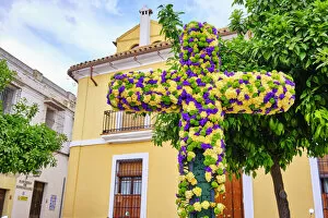 A popular district with the Plaza full of flowers during the Cruces de Mayo (May Crosses) Festival. Cordoba, Andalucia