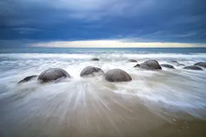 Horizon Over Water Prints: Popular Moeraki Boulders in South Pacific Ocean against cloudy sky, Hampden, North Otago