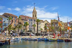 Port harbor filled with traditional wooden fishing boats at Sanary-sur-Mer, Var department