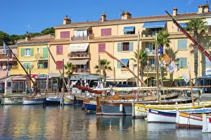 Port harbor filled with traditional wooden fishing boats at Sanary-sur-Mer, Var department