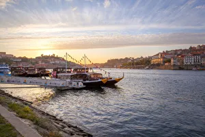 Port wine boats moored on the south bank of Douro River, Porto, Portugal