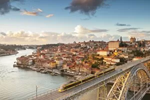 Images Dated 6th June 2017: Porto at sunset with a train on Louis I ∞ bridge on Douro River