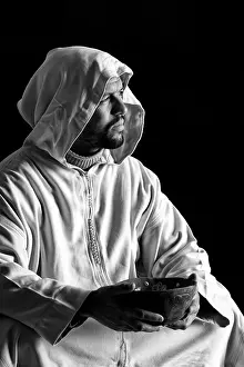 Wearing Prints: Portrait of a Berber man wearing traditional Djellaba, Merzouga, Morocco