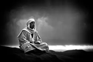 Sitting Prints: Portrait of a Berber man wearing traditional Djellaba and cheche (headscarf)