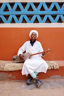 Indigenous People Prints: Portrait of a Gnawa musician, near Merzouga, Sahara Desert, Morocco