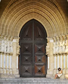 Images Dated 8th May 2014: Portugal, Alentejo, Evora, Evora cathedral, woman reading (MR)