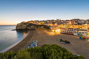 Portugal, Algarve, Faro district, Lagoa, Carvoeiro. Cityscape at dusk