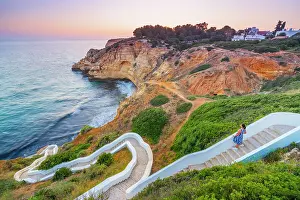 Sitting Prints: Portugal, Algarve, Lagoa, Carvoeori, Steps leading to sea at dusk (MR)
