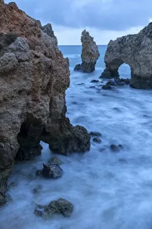 Portugal, Algarve, Lagos, Sea stacks and arch on coast