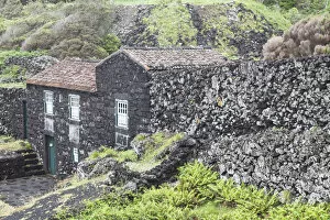 Images Dated 31st October 2017: Portugal, Azores, Pico Island, Porto Cachorro, old fishing community set in volcanic rock