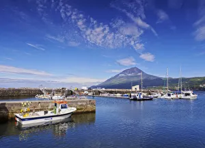 Portugal, Azores, Pico, Lajes do Pico, View of the port with Pico Mountain in