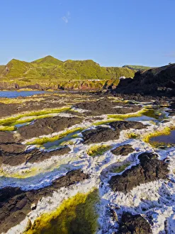 Portugal, Azores, Sao Miguel, Mosteiros, Rocks covered with the sea salt