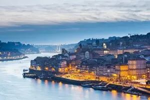 Portugal, Douro Litoral, Porto. Dusk in the UNESCO listed Ribeira district of Porto
