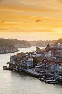 Images Dated 6th July 2016: Portugal, Douro Litoral, Porto. Sunset over the UNESCO listed Ribeira district, viewed