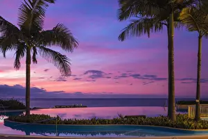 Early Morning Prints: Portugal, Madeira, Funchal, Sunrise reflecting in infinity pool at Pestana Casino Hotel