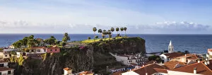 Portugal, Madeira, Funchal, View of Camara de Lobos beneath Ilheu gardens