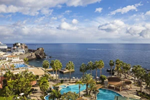Portugal, Madeira, Funchal, View of Royal Savoy Hotel swimming pool