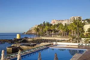 Portugal, Madeira, Funchal, View of swimming pool and Hotel Belmond Reids Palace
