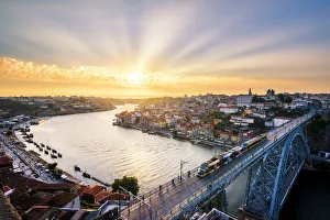 Images Dated 17th July 2018: Portugal, Norte region, Porto (Oporto). Dom Luis I bridge and Douro river at sunset