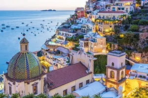 Landmarks Prints: Positano, Salerno Province, Campania, Italy. View of the center of Positano at dusk