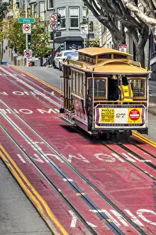 Images Dated 23rd March 2022: Powell and Market line cable car climbing a steep street, San Francisco, California, USA