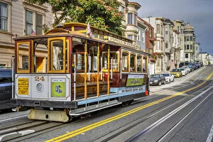 Powell and Market line cable car in a street of Russian Hill district, San Francisco, California, USA
