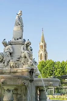 Historical Centre Prints: Pradier Fountain and the Church of Sainte Perprtue in the background, Nimes, Gard, France