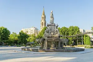 Historical Centre Prints: Pradier Fountain and the Church of Sainte Perprtue in the background, Nimes, Gard, France