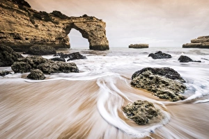 Portoguese Prints: Praia de Albandeira, Lagoa, Algarve, Portugal. Waves between the rocks on the beach