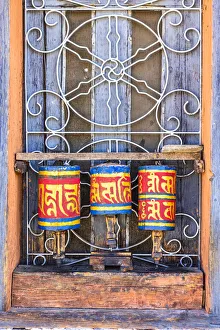 Prayer wheels in Jambey Lhakhang, Jakar, Bumthang District, Bhutan Prayer wheels in Jambey Lhakhang, Jakar, Bumthang District, Bhutan