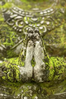 Statues Prints: Praying hands of a statue at the Taman Ayun Temple, Bali, Indonesia