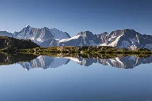 Reflected Prints: The Presanella group reflected into the Strino lakes, Val di Sole, Trentino-Alto Adige