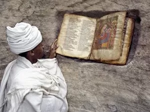 Images Dated 5th February 2009: A Priest of the Ethiopian Orthodox Church reads a very old