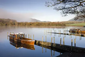 Keswick Prints: Princess Margaret Rose boat moored on Derwent Water on a beautiful autumn morning