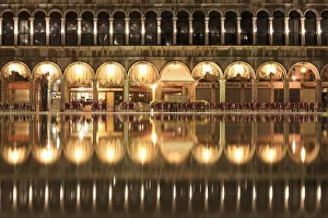 Acqua Alta Gallery: Procuratie Vecchie, the Caffa Quadri reflected in the high Water (Acqua alta) of St