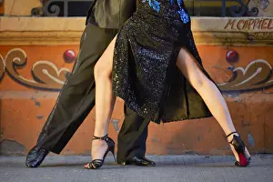 Detail of Professional Tango Dancers with Filieteado Art'in the background, Jean Jaures street, Abasto, Buenos Aires, Argentina. (MR)