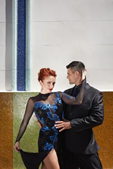 Images Dated 11th March 2022: Professional Tango Dancers in front of the wall of the 'Catulo Tango Club'in the Abasto neighborhood