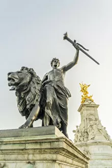 Prometheus or Progress statue and the Victorial Memorial outside Buckingham Palace