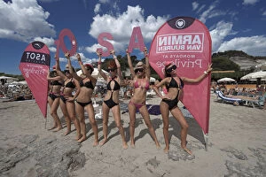Images Dated 3rd November 2014: Promotion teams of the big clubs advertise in front of the Sa Trinxa- Beach Bar, Platja