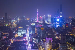 Images Dated 14th November 2014: Pudong skyline and East Nanjing Road, Shanghai, China