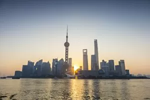 Images Dated 10th November 2014: Pudong skyline across the Huangpu river, The Bund, Shanghai, China